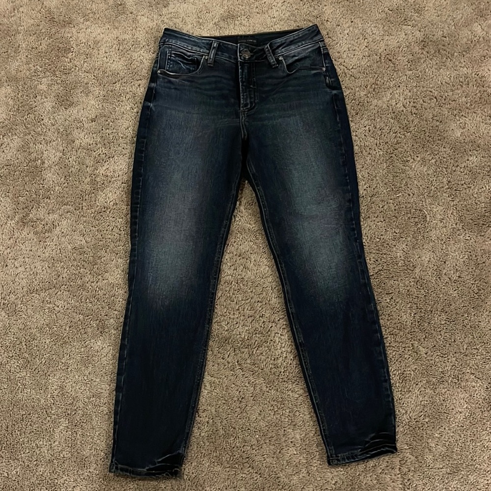Silver jeans. Never worn. No tags